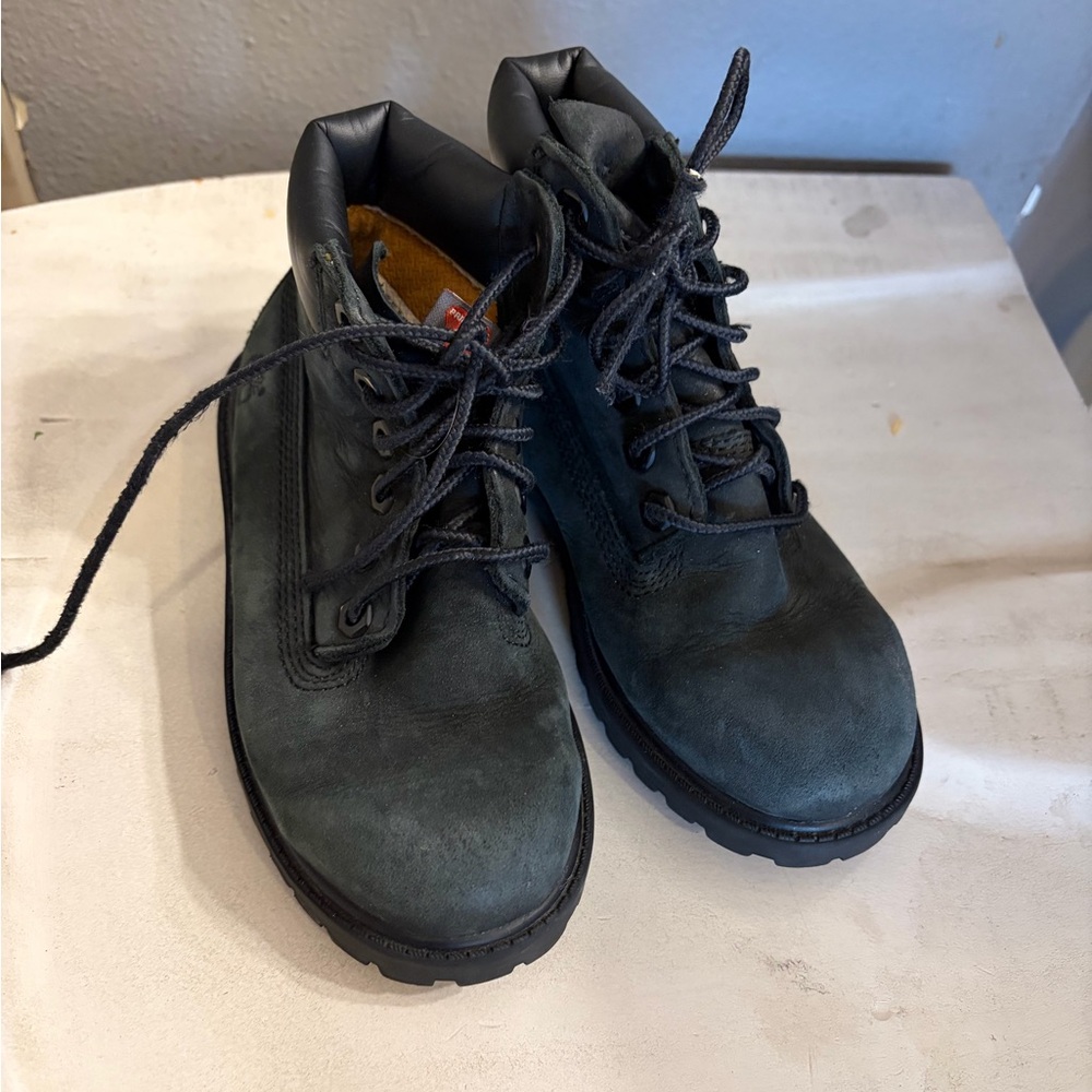 Kids black Timberland boots